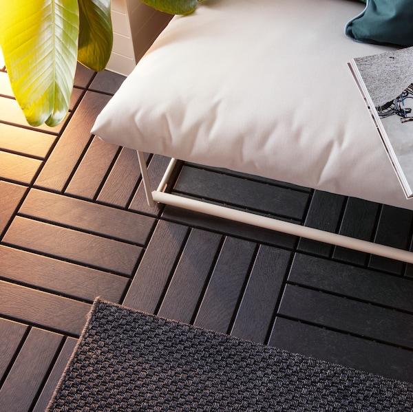 A dark grey RUNNEN floor decking, outdoor outside