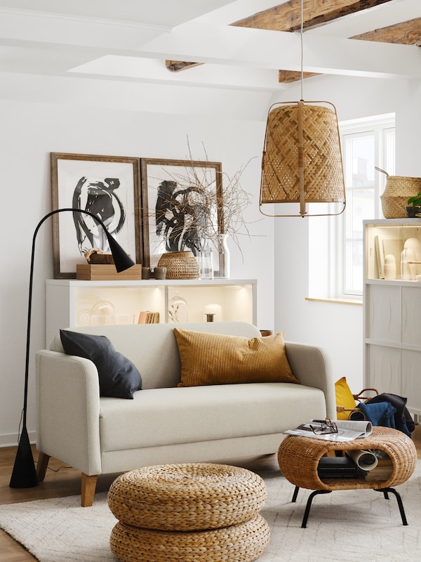 A black DELAKTIG LED floor lamp