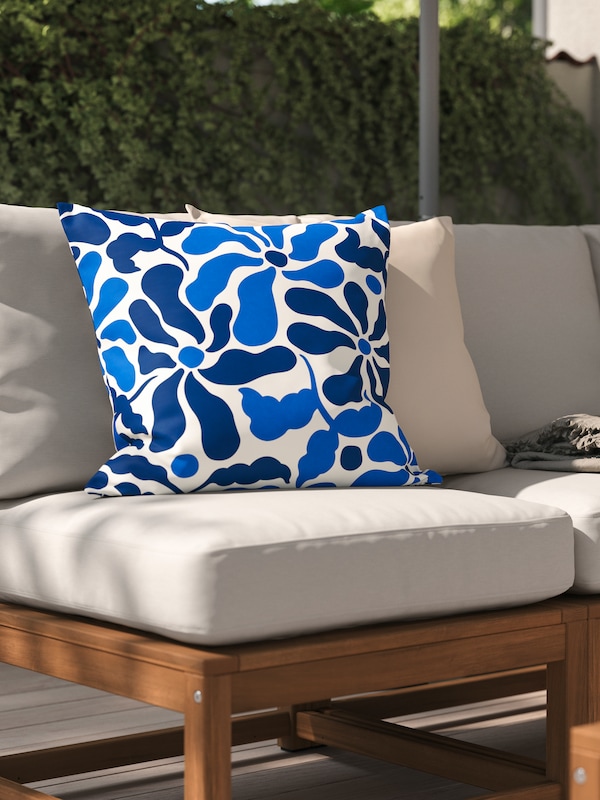 A blue floral pattern/outdoor indoor  GULLBERGSÖ cushion cover