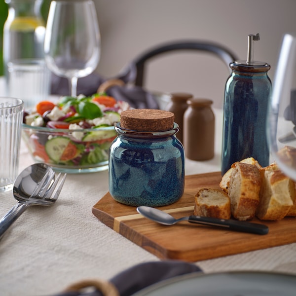 A blue BRUGDHAJ jar with lid