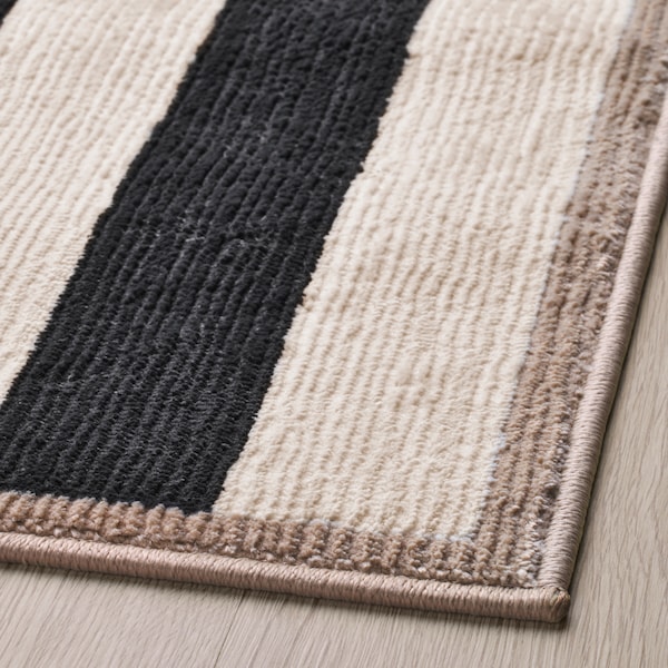 A multicolour ELSYSTEM rug, low pile