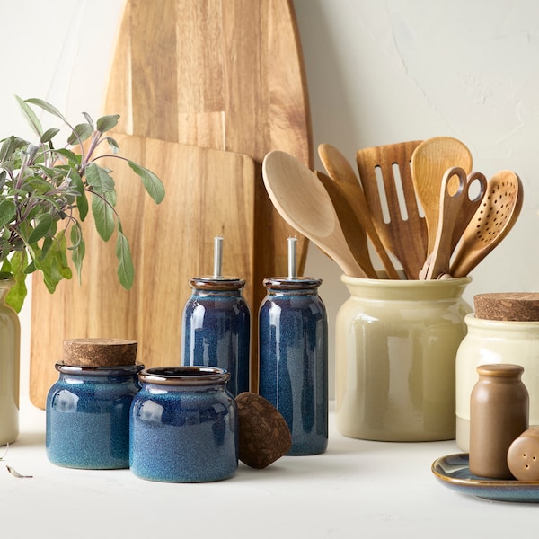 A beige BRUGDHAJ utensil holder