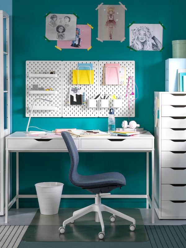 A white FNISS waste bin in the home office