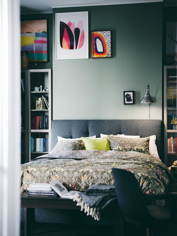 An olive-green GURLI cushion cover