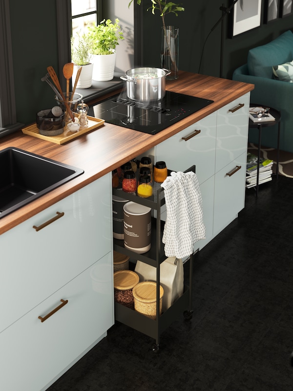 A brown walnut effect/laminate EKBACKEN worktop