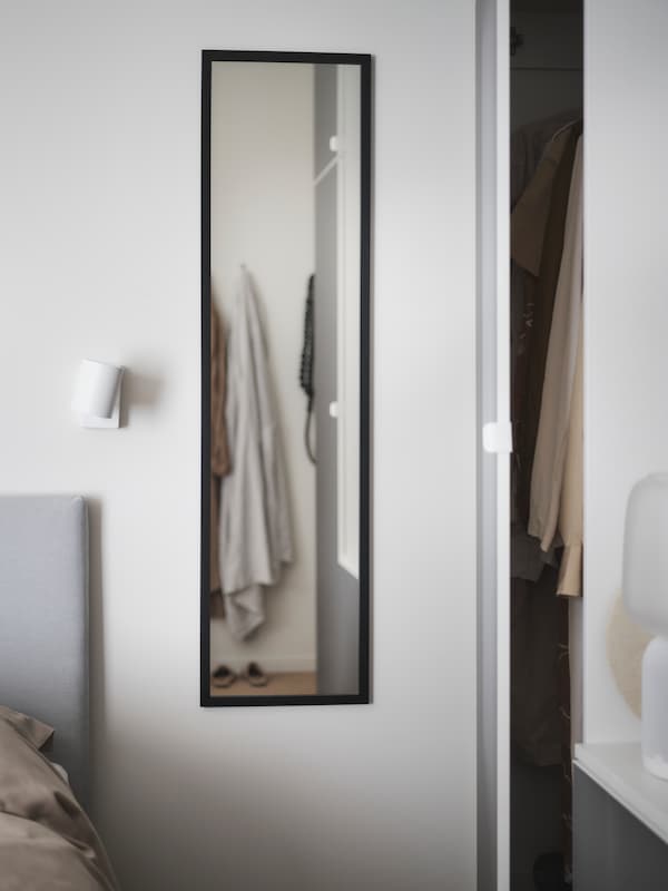 A black LILJETRÄD mirror