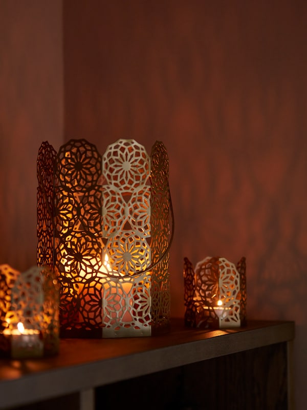 A gold-colour GOKVÄLLÅ lantern