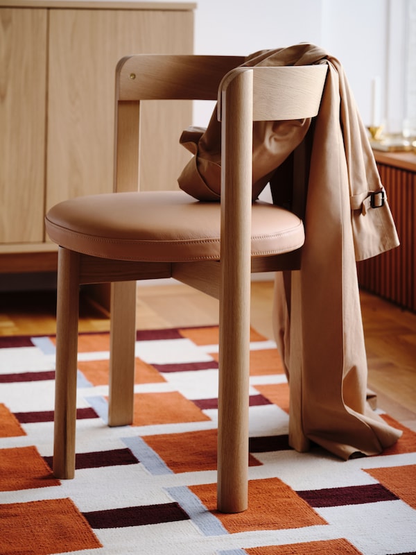 An oak/leather STOCKHOLM 2025 chair