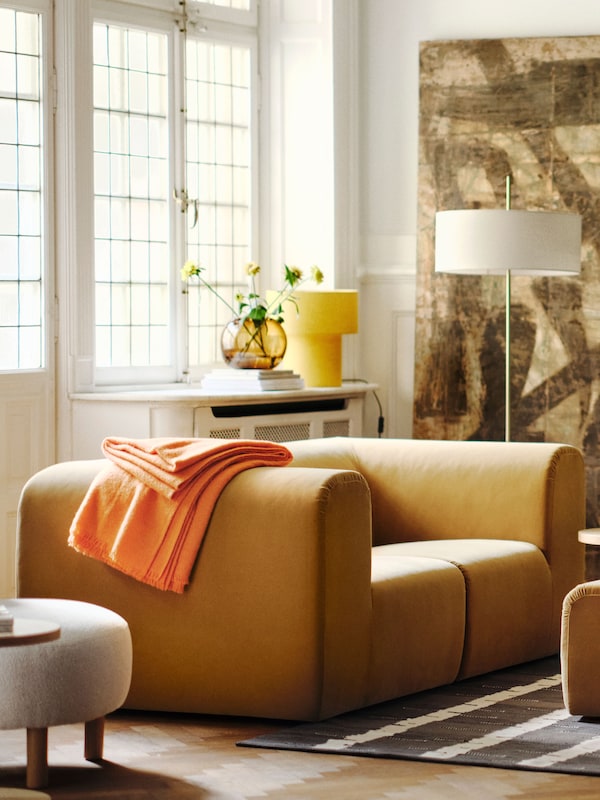 A Djurmo beige STOCKHOLM 2025 armchair in the living room