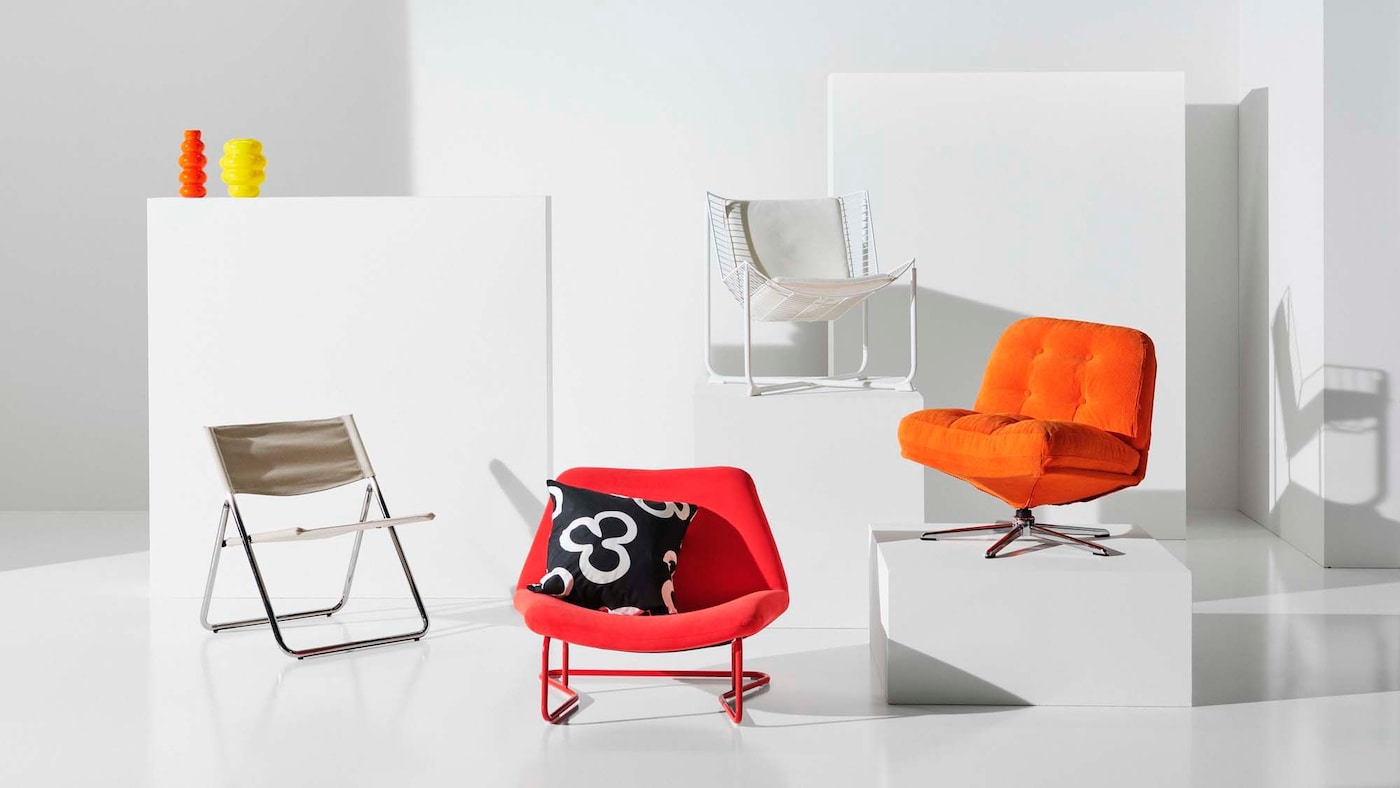 A white studio space with objects from the latest Nytillverkad collection, positioned on white podiums.
